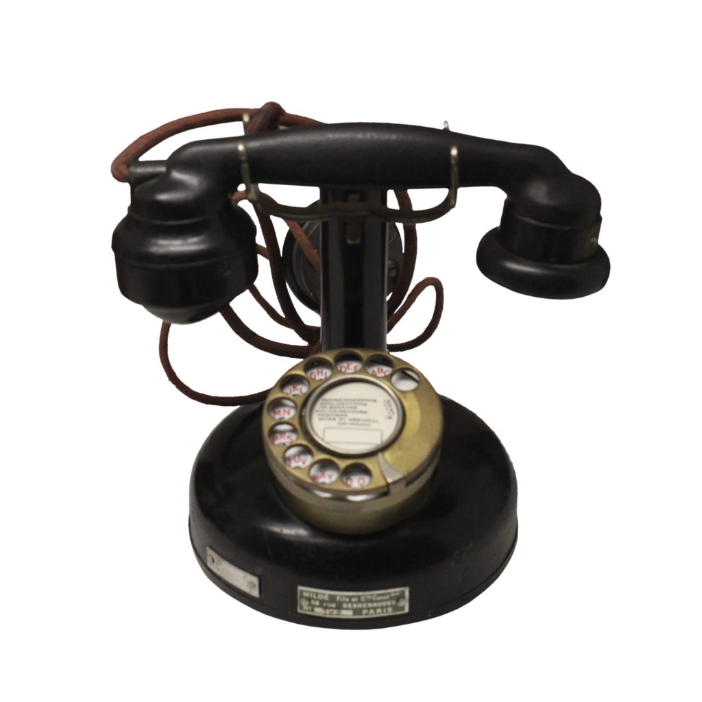 Old-style rotary phone. Courtesy of Wikimedia Commons.